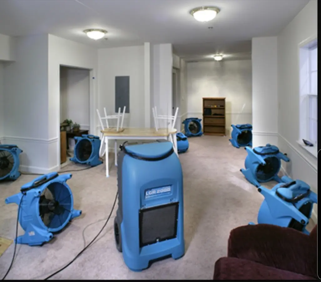 Air movers and dehumidifier setup for Water Damage Restoration in Moorhead